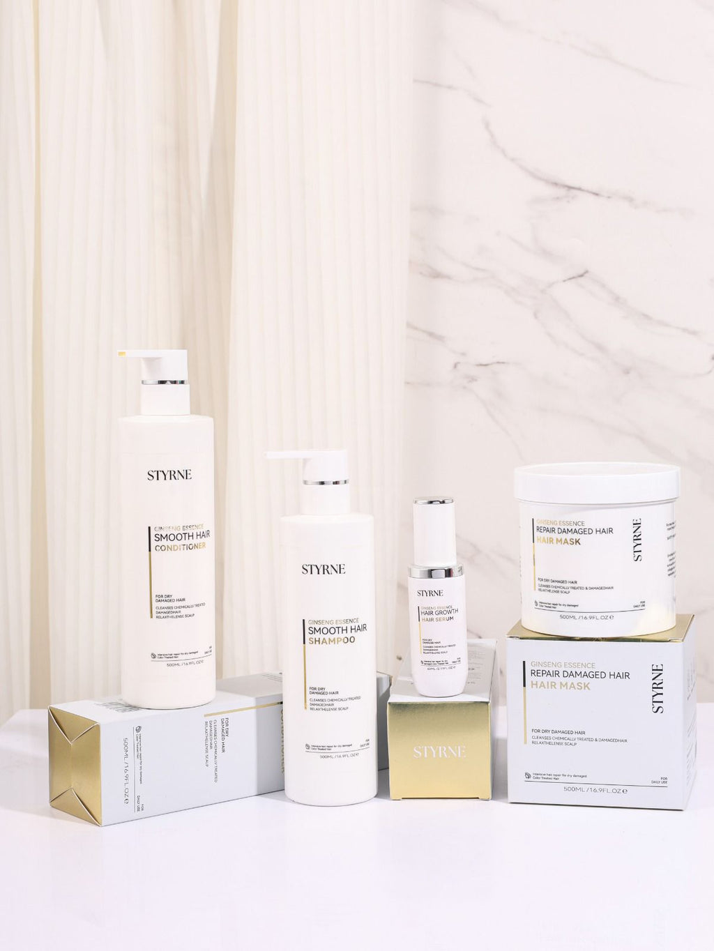Image containing shampoo, conditioner bottles and hair oil and hair mask containers