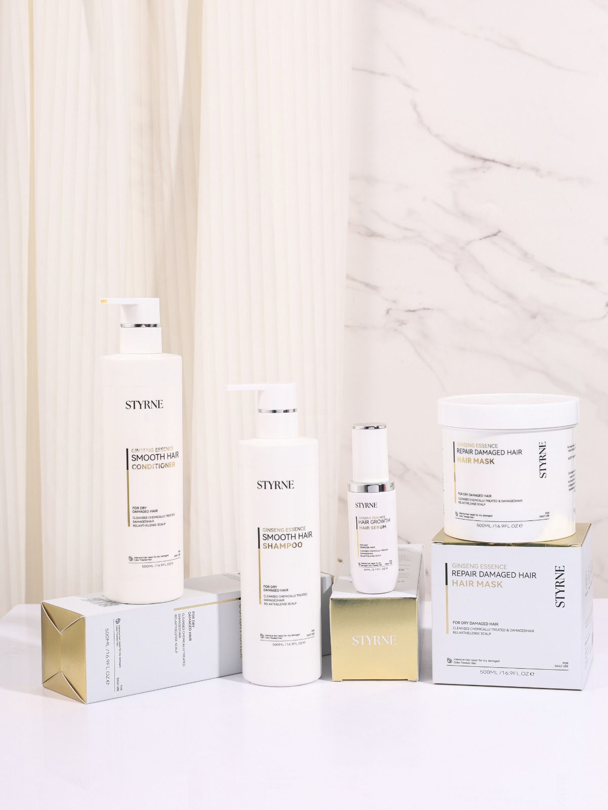 Image containing shampoo, conditioner bottles and hair oil and hair mask containers