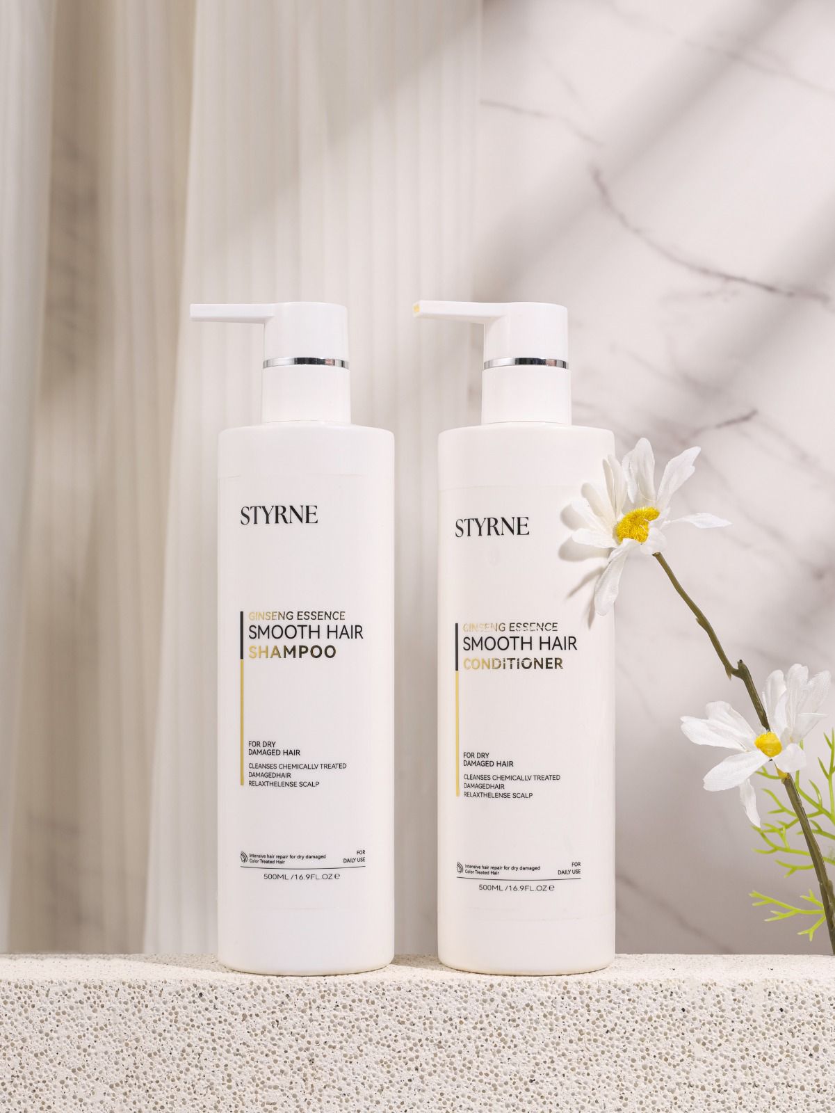 Image of 2 white pump bottles labelled 'Styrne' Shampoo & Conditioner
