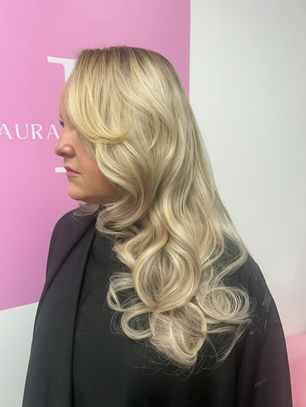 Photo showing blonde hair extensions